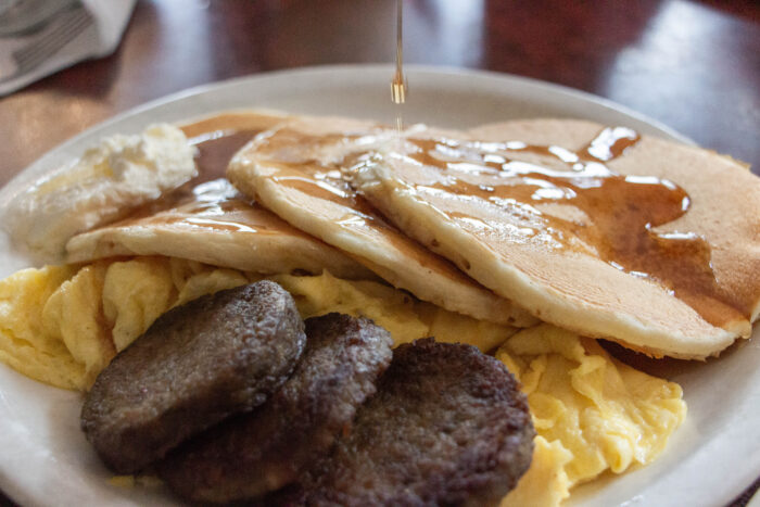 The best local restaurants in Nashville, Tennessee - Pancakes with syrup, sausage, and eggs at the Pancake Pantry