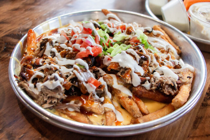 The best local restaurants in Nashville, Tennessee - BBQ loaded fries with pulled pork and cheese sauce at Edley's