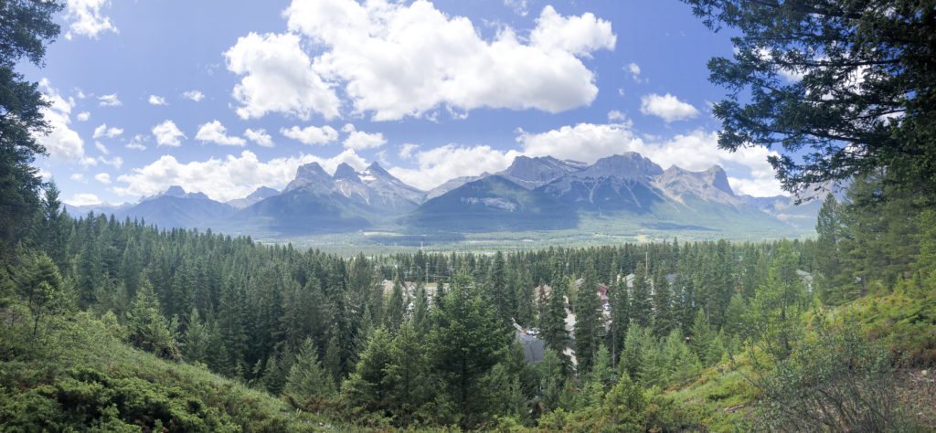 Panoramic view of Canmore and Three Sisters Mountains