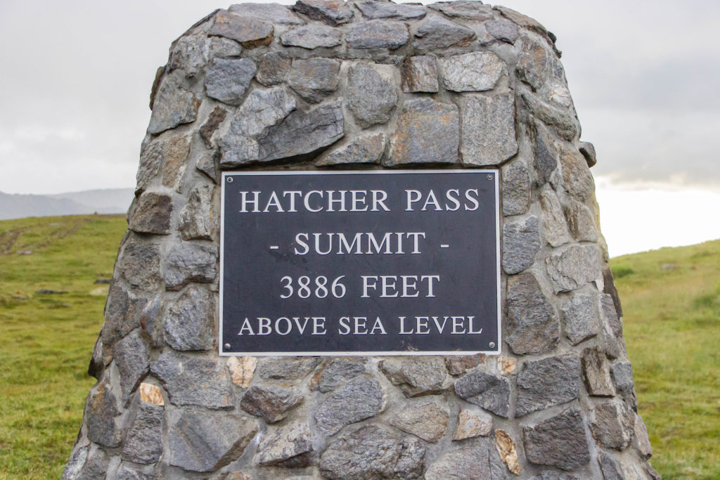 hatcher pass summit 388 feet above sea level stone sign