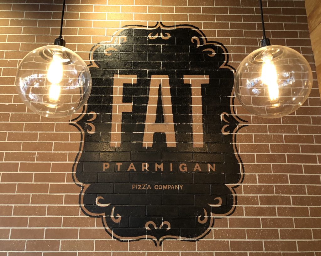 Fat ptarmigan italian restaurant sign with lights in anchorage alaska