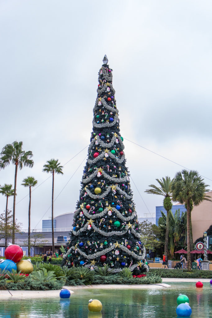 Hollywood studios Christmas tree, palm trees, and floating ornaments Disney World at Christmas Time
