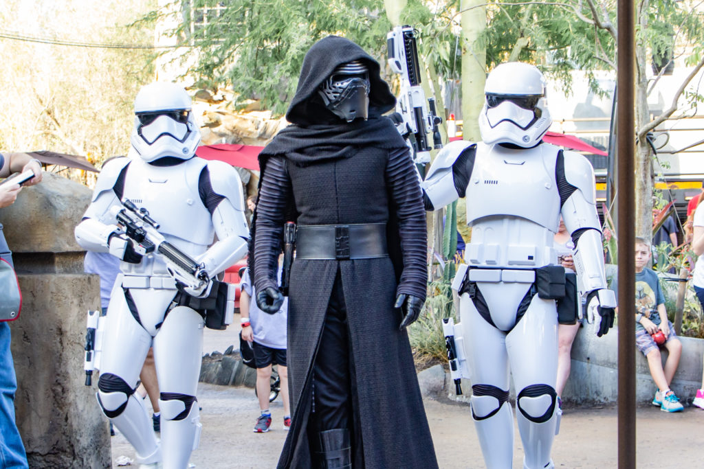 Kylo Ren and 2 stormtrooper guards characters walking around at Star Wars galaxy's edge Disney World Hollywood Studios Orlando Florida