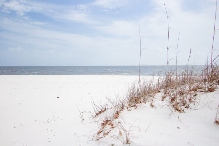 Day Trip to Long Beach, Mississippi - cloudy day by the ocean on the sand dunes