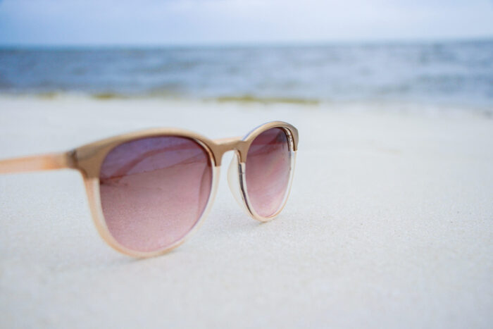 Day Trip to Long Beach, Mississippi -pink sunglasses in the sand