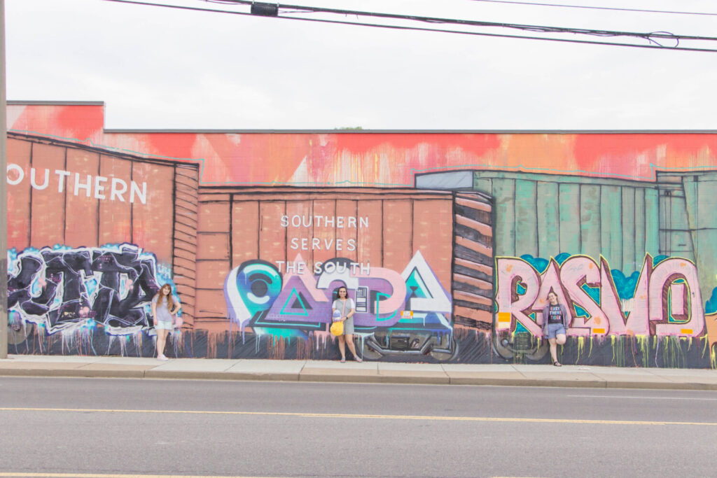 Nashville Tennessee street art you don't want to miss - Off the Wall Charlotte Avenue train mural by the UH crew