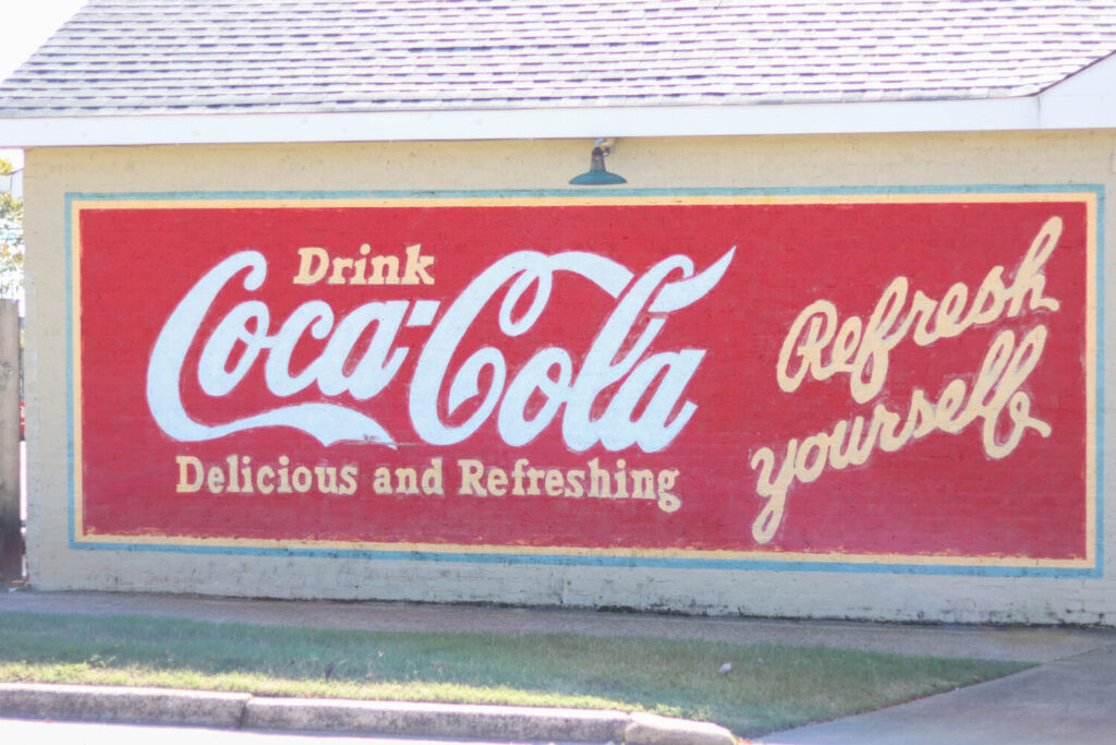 Murals in Corinth Mississippi - Drink Coca Cola Refresh Yourself Mural across from Coke Museum
