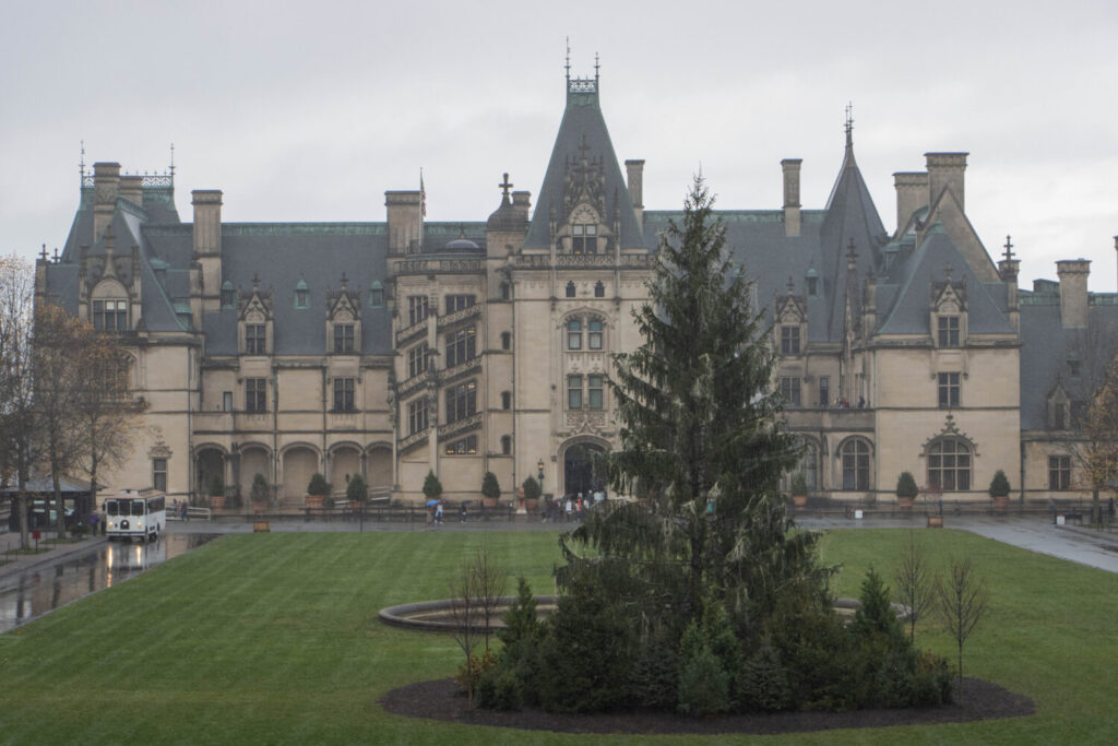 Why You Should Visit the Biltmore Estate at Christmas Time - Outside the Biltmore House during Christmas on a rainy day