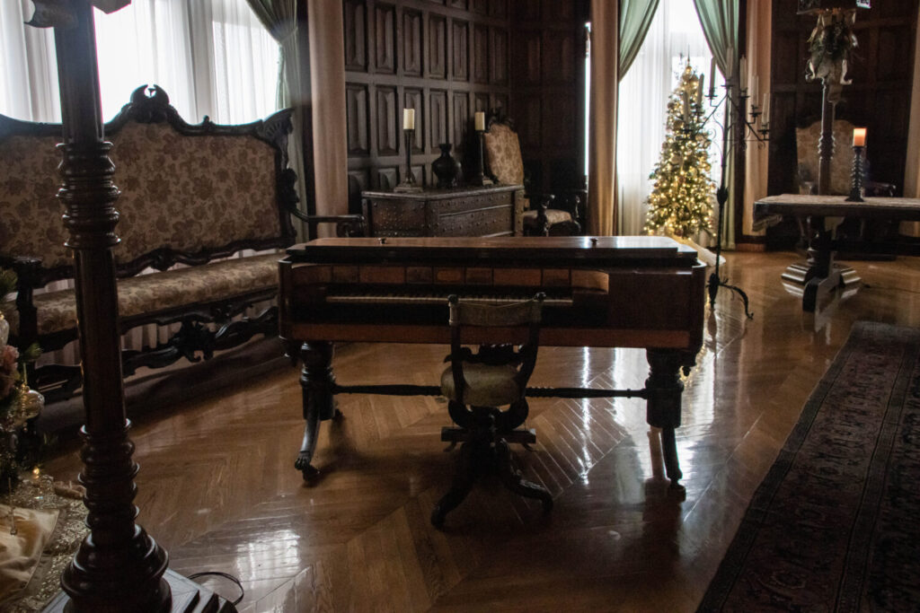 Why You Should Visit the Biltmore Estate at Christmas Time - The music room with and antique piano