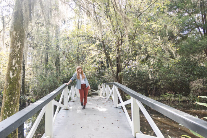 Exploring Historic Magnolia Plantation and Gardens in Charleston, South Carolina - Spanish moss covered trees and white bridge